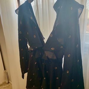 Navy blue romper with small beige flowers